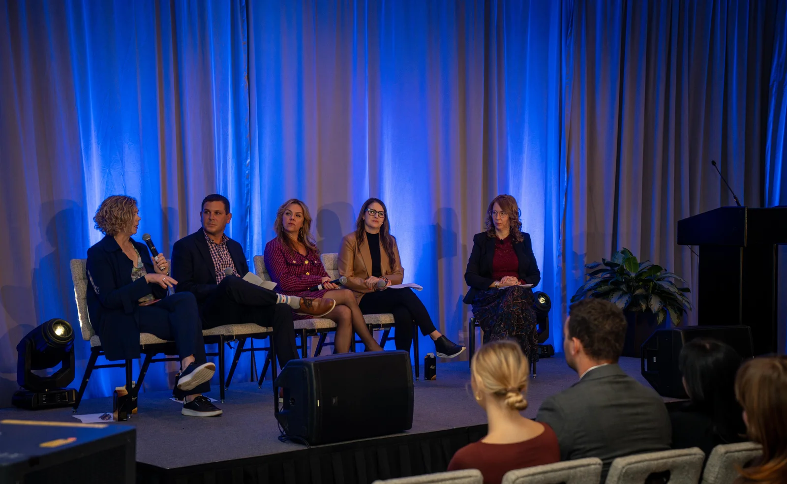 Panel on stage at an association program