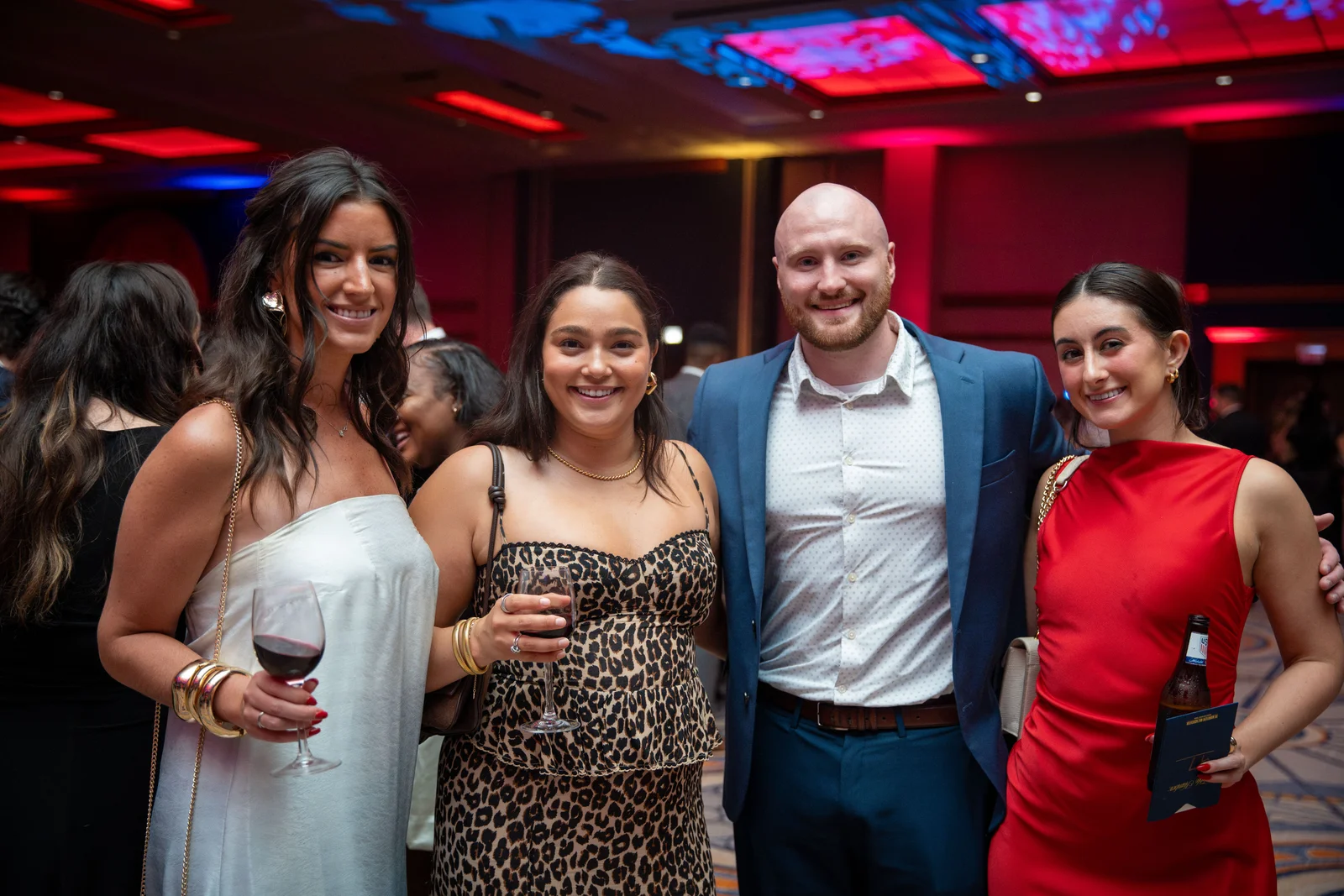 Guests in evening wear at a gala